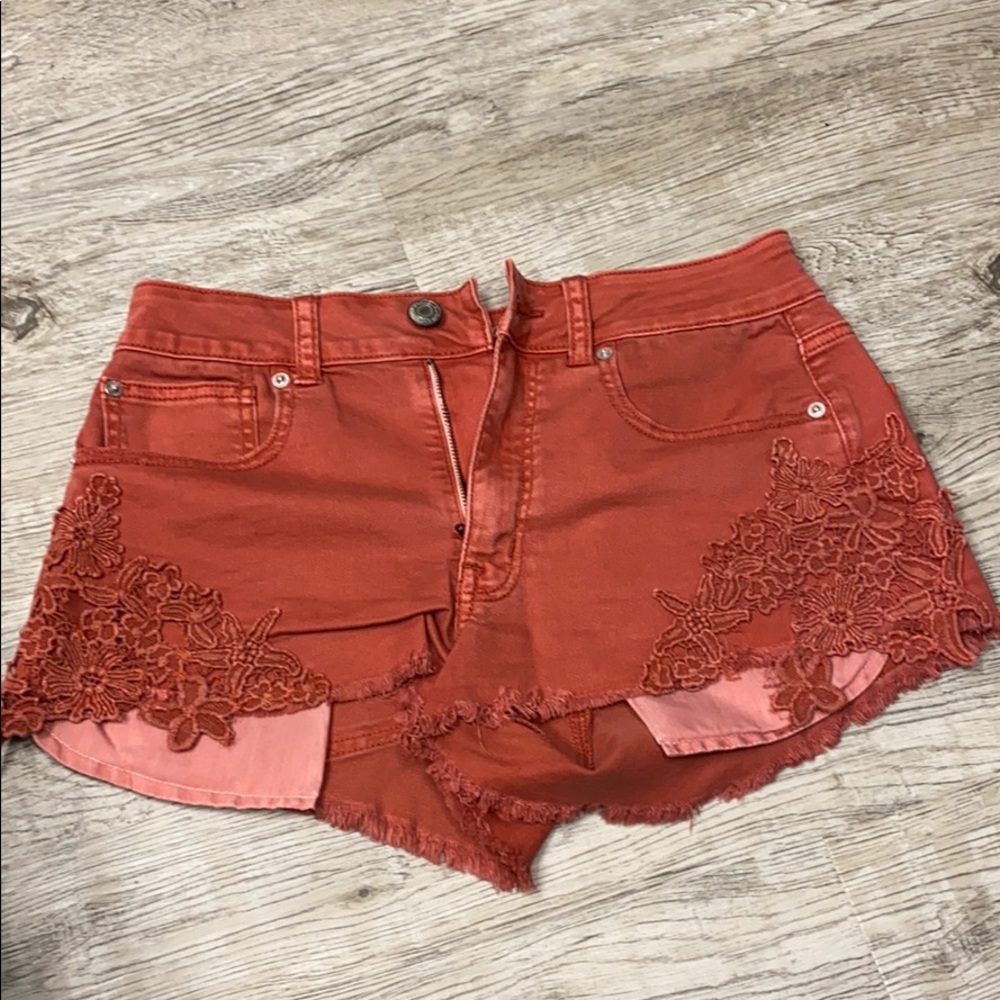 Red American Eagle Jean shorts.